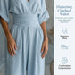 Női V-nyakú, magas derekú, széles szárú jumpsuit