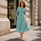 👗✨ Sukienka midi z kwiatowym nadrukiem i elastyczną, marszczoną talią, rękawami 3/4, zwiewną spódnicą — różowa, niebieska, zielona, fioletowa 👗