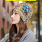 Versatile knitted pile hat with small embroidered flowers that show your face