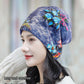Versatile knitted pile hat with small embroidered flowers that show your face